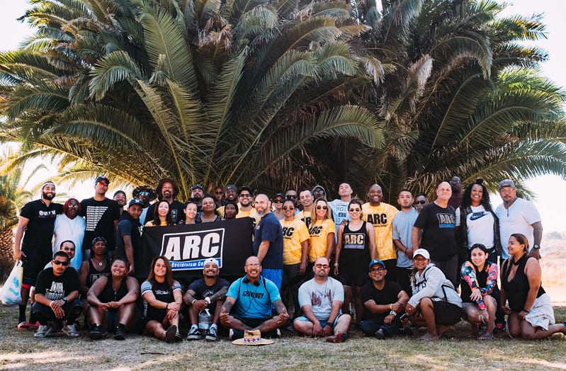 ARC Staff Group Photo in Front of Palm Trees
